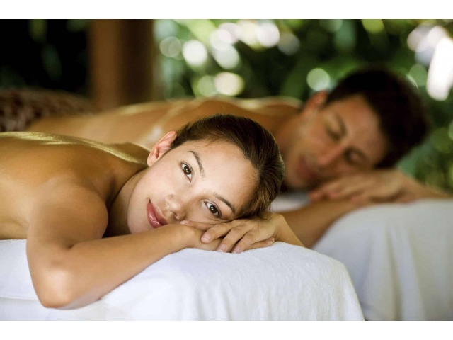 A man and a woman getting a massage