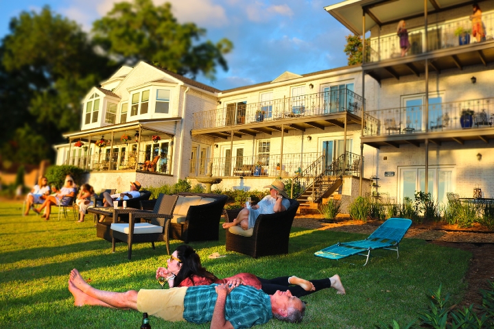 Guests enjoying sunset at Jubilee Suites on Mobile Bay