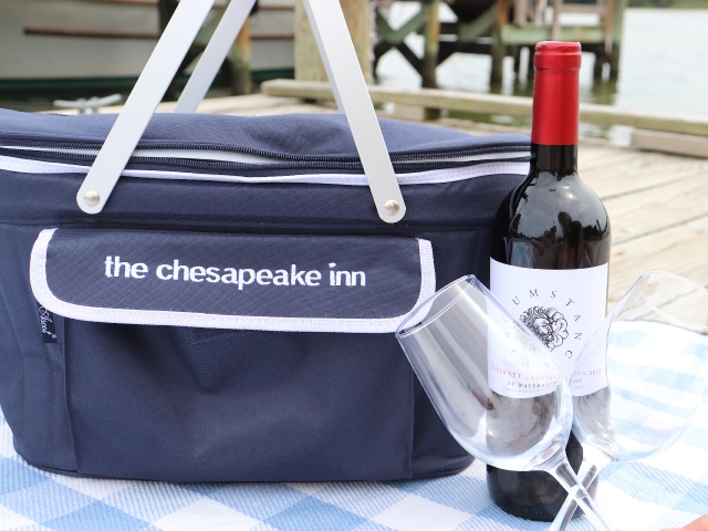 The Chesapeake Inn picnic basket and wine bottle at the marina