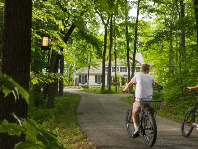 Couple riding bikes at the inn