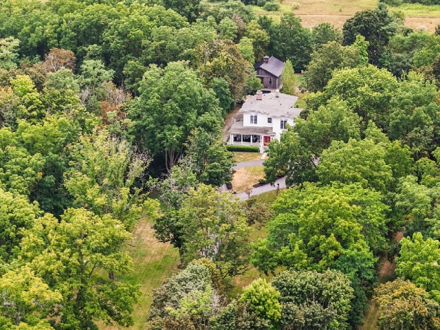 Seven private acres wrapped around a home that welcomes you in