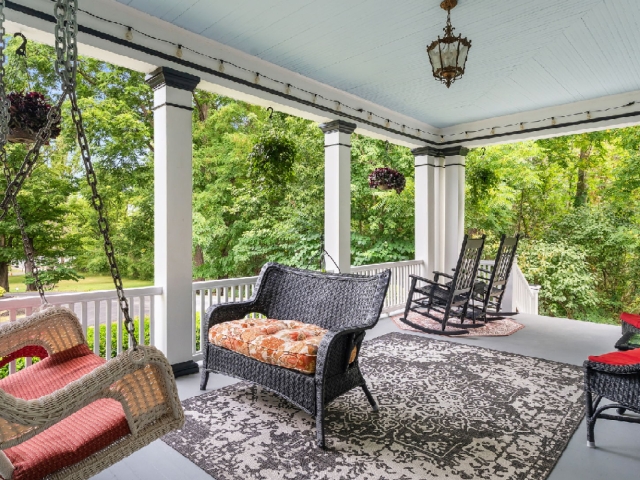 A wraparound porch made for lingering, just as it has for generations.