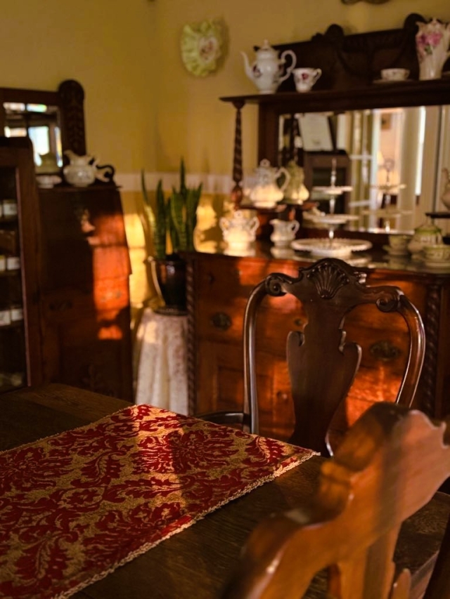 Pieces collected over generations, settling into the rooms as naturally as the light.