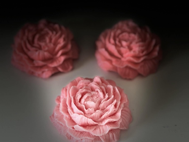 And peonies we craft by hand, shaped petal by petal with the same tenderness