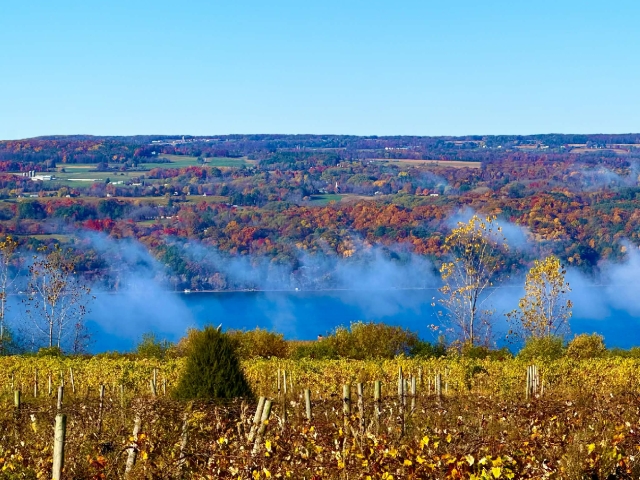 Finger Lakes fall doesn’t whisper; it erupts—color on the hills, gold in the vines, and the lake sending up its own kind of magic.