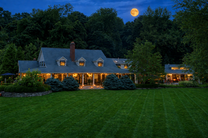 Beautiful Harvest Moon Over The Welsh Hilld Inn at Dusk