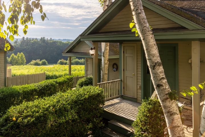 exterior entrance of our cottages on a golden summer evening